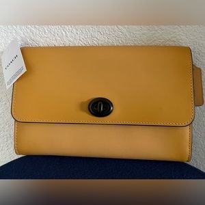 NEW Coach leather purse/clutch.